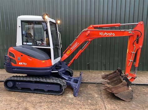 mini digger and man|used small diggers for sale.